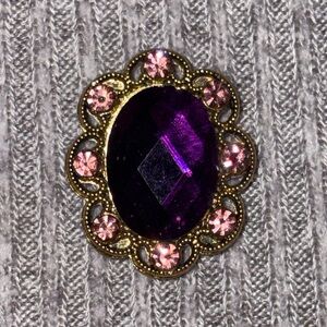 Vintage gold tone floral pendant w purple stone encircled by pink rhinestones